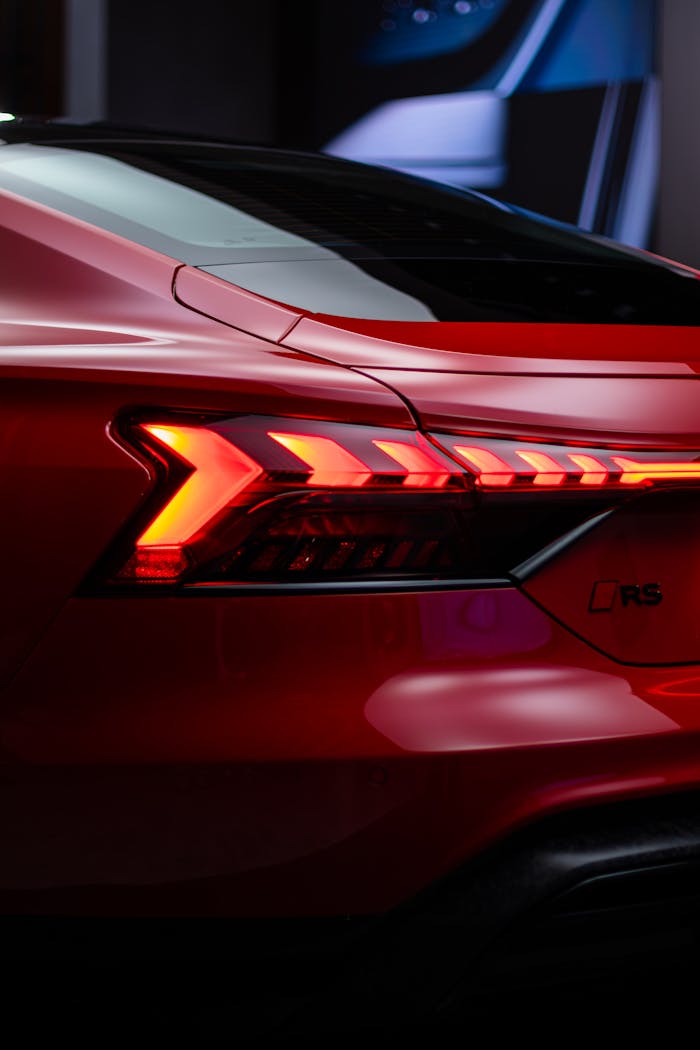 creative Close-up of a red Audi RS tail light with studio lighting in Toronto.